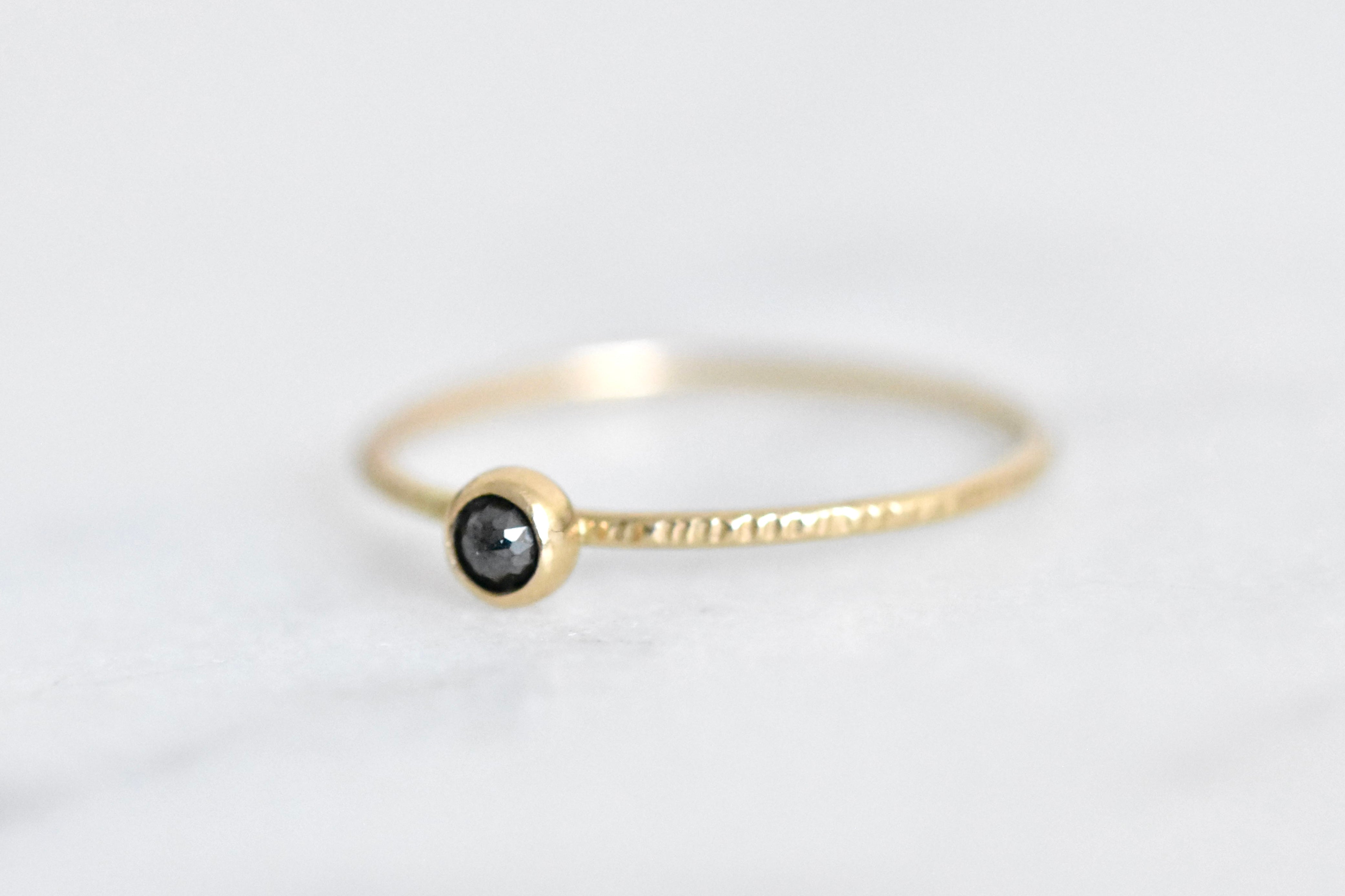 Small hot sale black ring